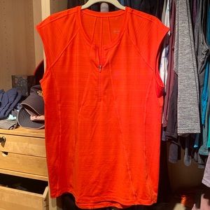 Bright Orange Athleta short sleeve bike/run shirt with zippered back pocket